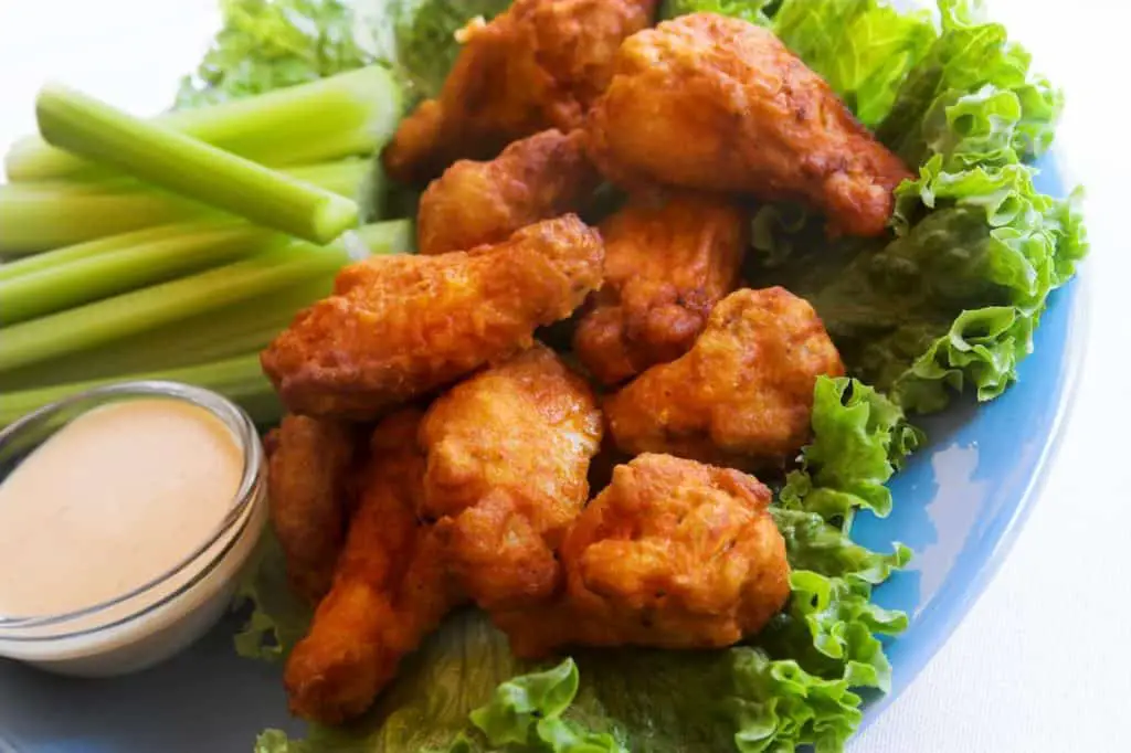 Buffalo chicken wings with dip and celery sticks - Are Chicken Wings Healthy