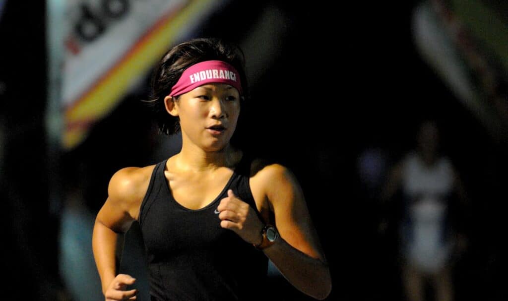 Endurance Head Band on Woman Marathon Runner - what are the components of physical fitness