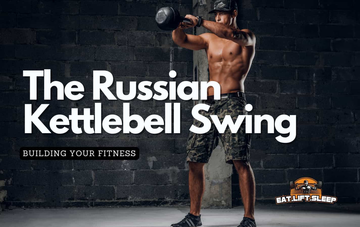 Man in a CrossFit gym doing kettlebell swings